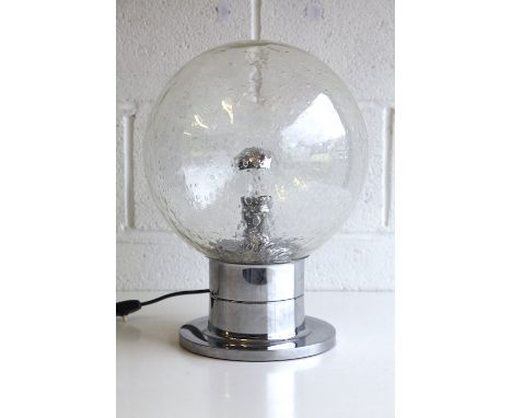 A retro 20th century 1970s chrome and glass table lamp light. The lamp having a large bubble effect clear glass globe shade s