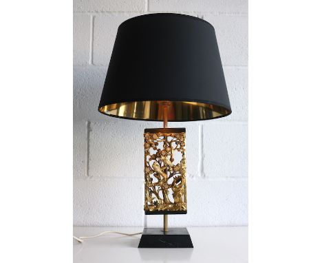 A vintage 20th century 1960s gilt and ebonised wood table lamp light. The lamp having a new black shade with gold interior su