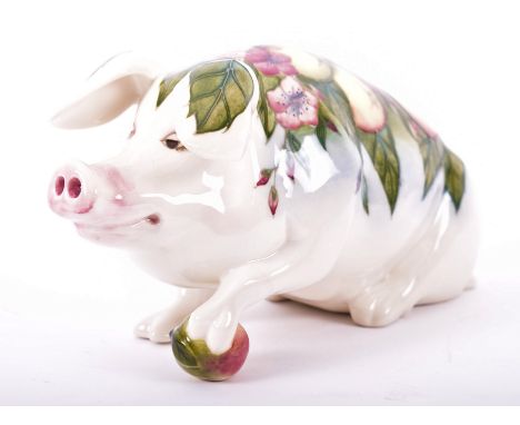 Moorcroft Pottery - a vintage 1990s ceramic Peter the Pig figurine. The pig designed by Roger Mitchell in the Temptation patt