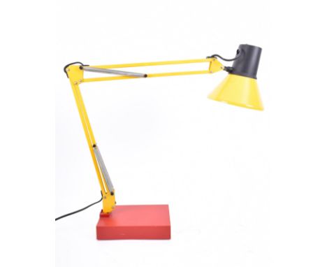 A retro 20th century 1960s Italian Anglepoise desk lamp light. The lamp having a pendant shade finished in yellow supported b