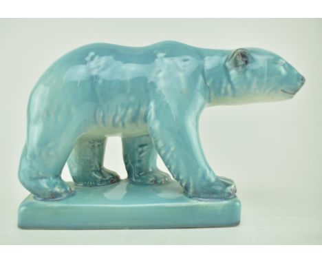 Beswick - a mid 20th century ceramic porcelain figurine of a polar bear. The polar bear painted in blue hue. Marked 417 to un