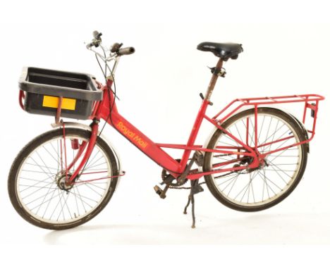 A vintage mid 20th century circa 1970s Royal Mail Post Office postman bicycle bike. The bike with painted frame front basket 