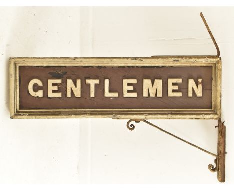 An original 1930s railway station wooden sign reading ' Gentlemen '. Wooden rectangular sign with white and brown colourway r