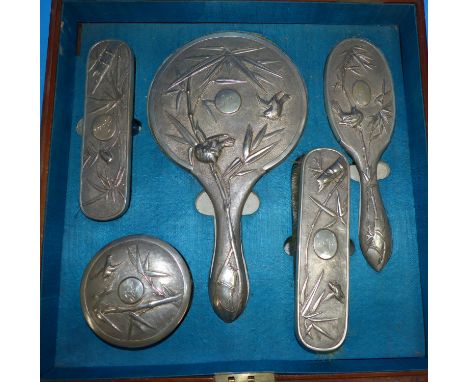 A late 19th or early 20th century Chinese silver dressing table set comprising circular powder bowl, silver mounted mirror, h