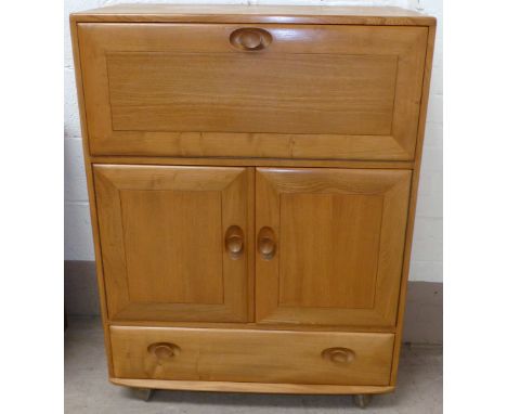 An Ercol elm secretaire desk, 32½"