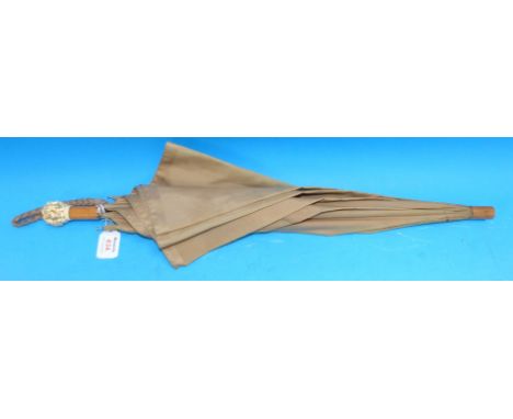 A parasol with Japanese signed multi-face finial