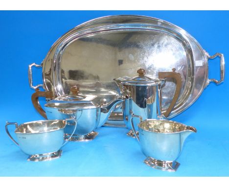 An Art Deco silver 4 piece tea and coffee service comprising teapot, coffee pot, cream jug and sugar basin, Sheffield 1954; a