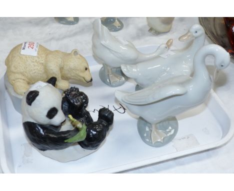 Three Nao geese; a ceramic polar bear and a panda by Eva Dalberg