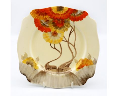 Clarice Cliff - a 'Rhodanthe' patterned Art Deco plate, hand painted in brown and orange shades depicting stylised trees and 