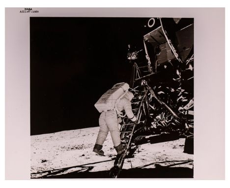 Apollo 11 mission Nasa code AS11-40-5868Astronaut Edwin E. Aldrin Jr., lunar module pilot, descends the steps of the Lunar Mo