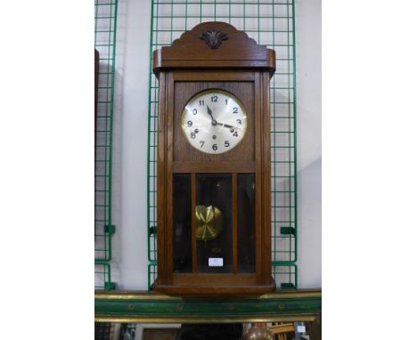 An oak wall clock 