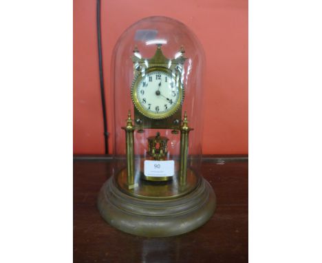 An anniversary clock, with glass dome 