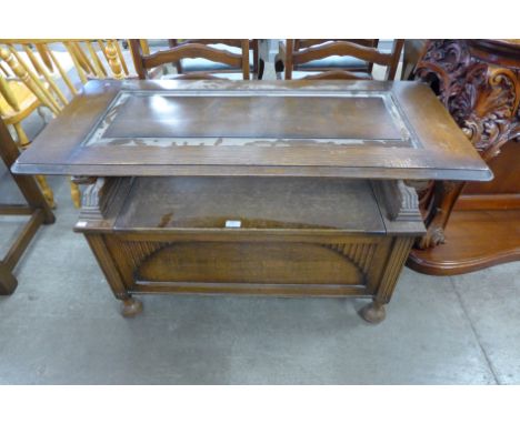 A carved oak monk's bench 