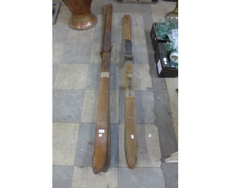 Two pairs of vintage oak skis 