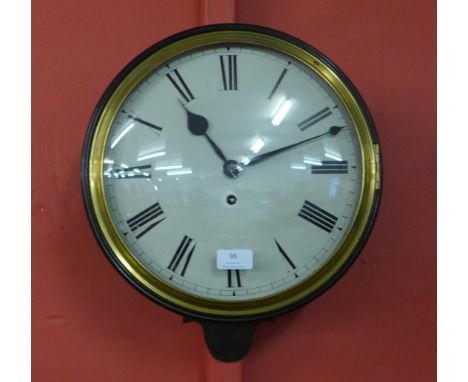 A Victorian style mahogany convex wall clock 