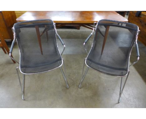 A pair of Charles Pollock Penelope chrome and black mesh chairs 