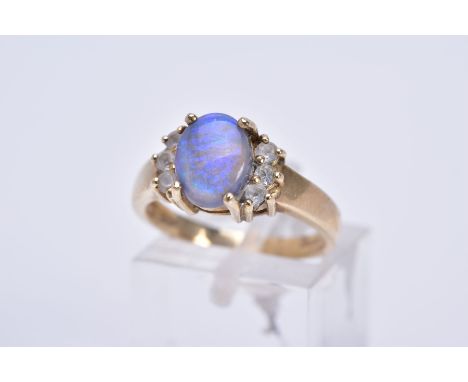 A 9CT GOLD SIMULATED OPAL AND CUBIC ZIRCONIA DRESS RING, hallmarked 9ct gold, approximate gross weight 3.5 grams