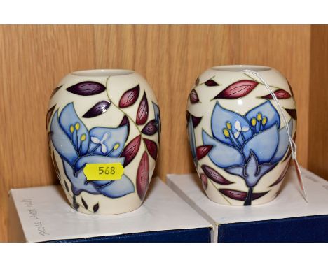 A PAIR OF BOXED MOORCROFT BALUSTER VASES, decorated in Jacobs ladder pattern on a cream ground, circa 2004, impressed and pai