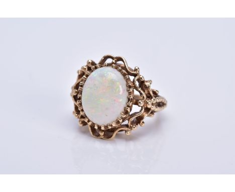 A LATE 20TH CENTURY 9CT GOLD OPAL SINGLE STONE RING, opal measuring approximately 14.5mm x 11.5mm, hallmarked 9ct gold, appro