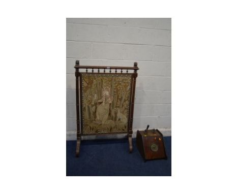 A LARGE EARLY 20TH CENTURY OAK FIRE SCREEN, with lion head's to top rail, turned and fluted upright's on scrolled legs and la