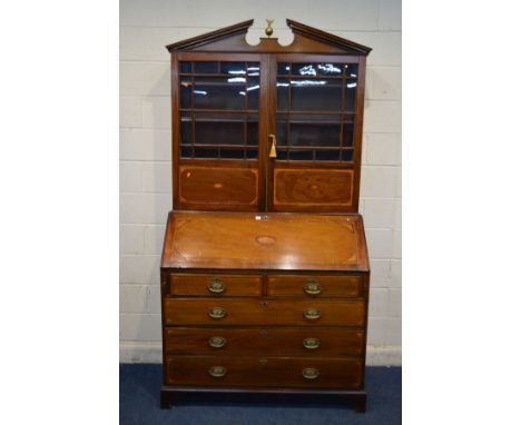 A GEORGIAN MAHOGANY, SATINWOOD STRUNG AND SHELL INLAID BUREAU BOOKCASE, with later swan neck top flanking a brass finial, dou