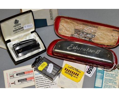 A CASED HOHNER EDUCATOR II HARMONICA, together with two Roson lighters, one boxed and one, together with printed leaflets, fl