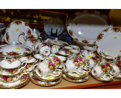 A ROYAL ALBERT OLD COUNTRY ROSES DINNER SERVICE, majority seconds, including oval meat platter, two twin handled tureens and 