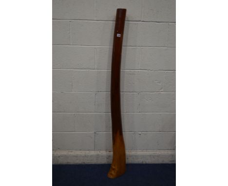 A DECORATIVE HARDWOOD LOUNGE ITEM in the style of a didgeridoo, height 163cm