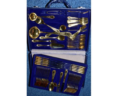 A BESTECKE SOLINGEN CANTEEN OF GILT CUTLERY FOR TWELVE PLACE SETTINGS, two tiers in a briefcase, includes soup ladle