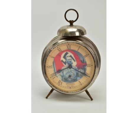 A POSSIBLE LATE WAR GERMAN 'HITLER' PROPOGANDA TABLE CLOCK, with white metal body and legs, Roman numeral dial, featuring a p