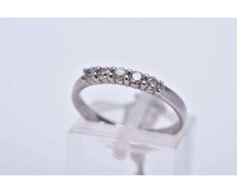 A MODERN PLATINUM DIAMOND FIVE STONE HALF HOOP RING, estimated total diamond weight 0.30ct, ring size M, hallmarked platinum,