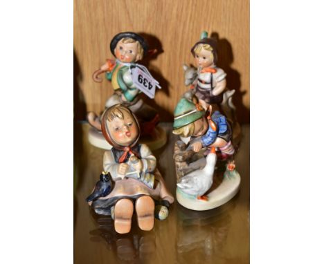 FOUR HUMMEL FIGURES 'Strolling Along HUM5, 'Happy Pastime' HUM69, 'Barnyard Hero' HUM195 and 'Little Goat Herder' HUM200 (4) 