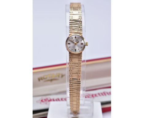 A MID TO LATE TWENTIETH CENTURY LADY'S ROTARY 9CT GOLD WATCH, a round case measuring approximately 14.7mm in diameter, silver