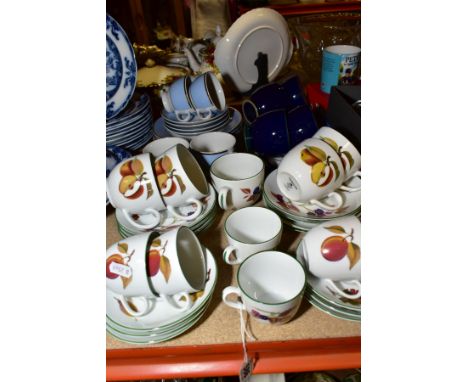ROYAL WORCESTER 'EVESHAM VALE' TEAWARES, comprising six 6cm cups and saucers, five 7cm cups and saucers with three spare sauc
