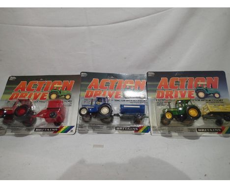 Britains Action Drive 3 corded diecast models by Britains, appearing in excellent condition on VG card, boxes with wear. UK P