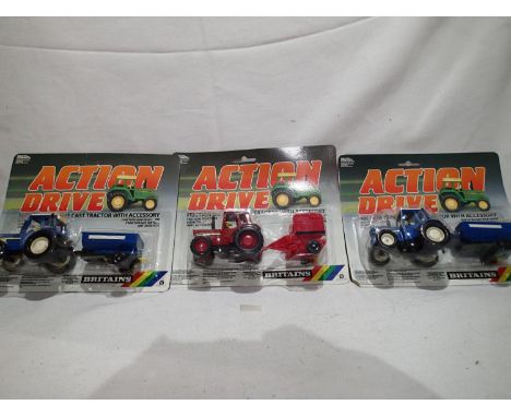 Britains Action Drive 3 corded diecast models by Britains, appearing in excellent condition on VG card, boxes with wear. UK P