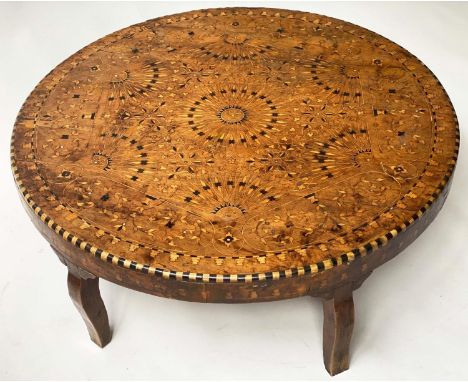 MOROCCAN LOW TABLE, 100cm diam., x 34cm H, 19th century, fruitwood, ebony and mother of pearl radial marquetry, with shaped s