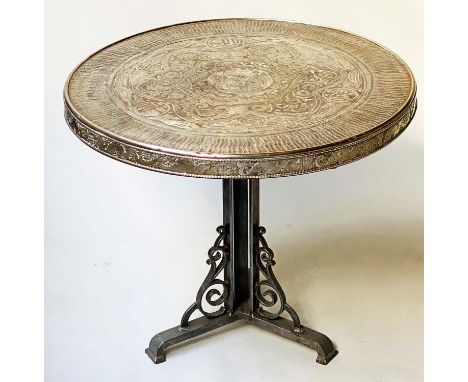 OCCASIONAL TABLE, 19th century Chinese circular repoussé silvered metal with serpent and cloud motifs on scroll cast iron sta