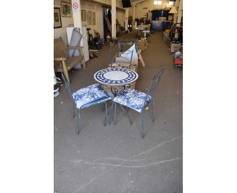 Tile top garden table and three chairs