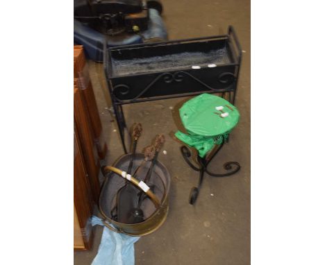 A coal bucket, fire tools, plant stand and an iron framed planter