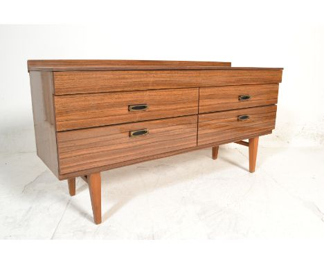 A 1950's retro vintage Meredew six drawer gallery backed sideboard credenza having a formica finish, each drawer having shape