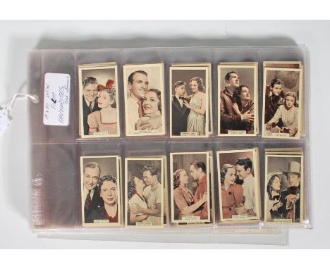 A full set of A and M Wix cigarette / trade cards ' Film Stars ' series together with a set of Kensitas J Wix ' Love Scenes f