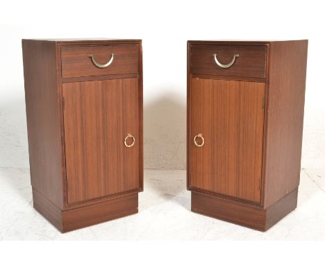 A pair of 1960's retro vintage Meredew teak wood bedside cabinets, each having a single drawer above a shelved cupboard, all 