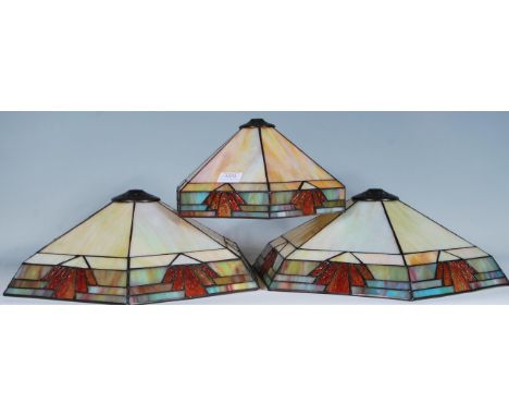 A matching pair of vintage 20th Century Tiffany style leaded glass hanging ceiling light shade of hexagonal form. Art Deco ma