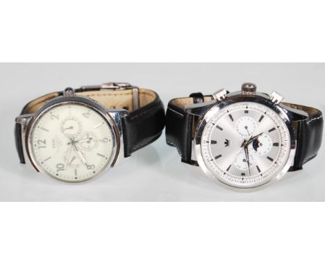 A TCM chronograph multi function automatic 100 meter waterproof watch having a white dial with arabic numerals to the chapter