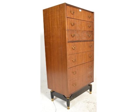 A retro mid 20th Century 1950's Ernst Gomme for G Plan Librenza tola wood bedroom tallboy chest of drawers, seven graduating 