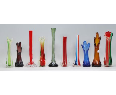 A selection of retro vintage studio art glass stem vases of various colours, many having pull rims, a green glass vase having