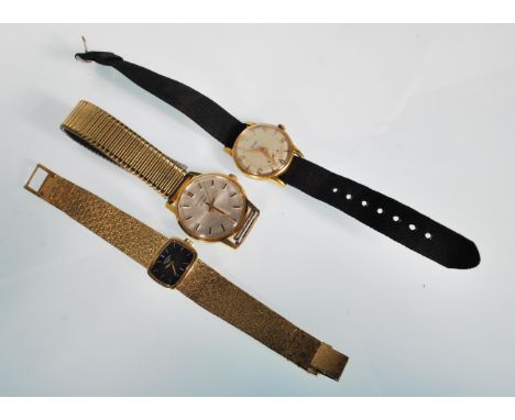 A group of three vintage wrist watches to include an Everite 17 jewels watch having a round face with a champagne dial with b