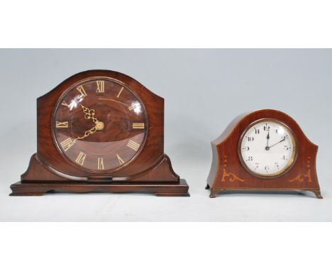 A 1920's Art Deco walnut cased Smiths eight day mantel clock having applied brass Roman numeral chapter ring with pierced han