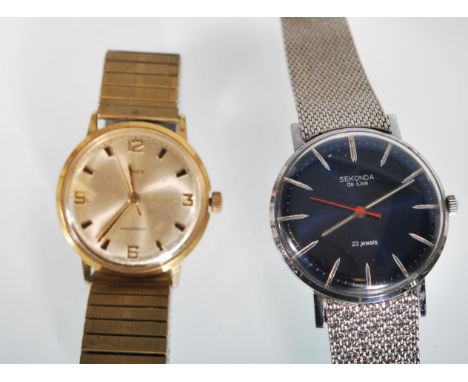 Two vintage gentleman's watches to include a Sekonda de luxe 23 jewels wrist watch having a blue dial with baton markings to 